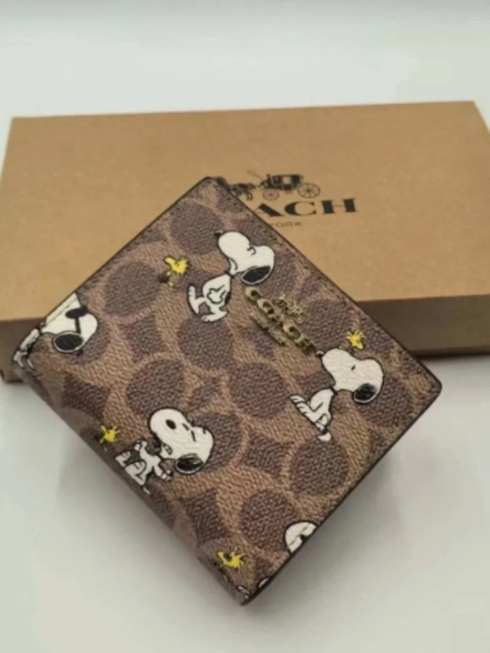 Coach X Peanuts Snap Wallet In Signature Canvas With Snoopy Print CBN32